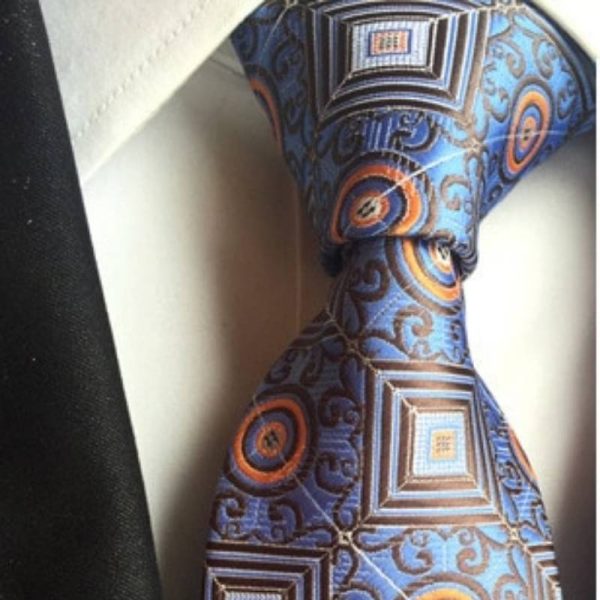 Cravate Bleue à Motifs CarréS Et Cercles